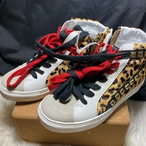 Steve Madden high top cowhide hair with studs